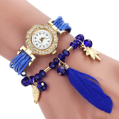 Fashion DIY Feather Pattern Women Dress Watches Weave Montre Femme Gold Leaf Owl Pendant Rhinestone Wristwatch Bracelet Jewelry Ro
Fashion DIY Feather Pattern Women Dress Watches Weave Montre Femme Gold Leaf Owl Pendant Rhinestone Wristwatch Bracelet Jewelry Ro