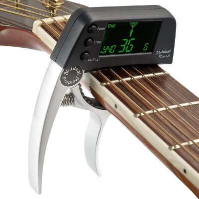 TCapo20 Multifunctional Aluminum Alloy 2-in-1 Guitar Capo Tuner with LCD Screen for Normal Acoustic Folk Electric Guitar Chromatic
TCapo20 Multifunctional Aluminum Alloy 2-in-1 Guitar Capo Tuner with LCD Screen for Normal Acoustic Folk Electric Guitar Chromatic