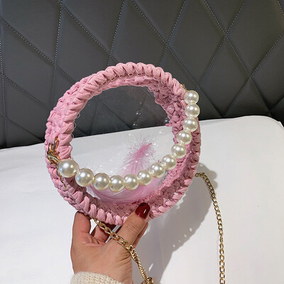 2019 new woven round pearl handbag female chic wild chain cosmetic bag personalized transparent Messenger bag
2019 new woven round pearl handbag female chic wild chain cosmetic bag personalized transparent Messenger bag
