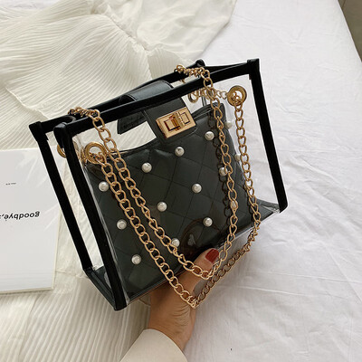 Summer transparent mother bag female 2019 new wave Korean version of the wild Messenger bag chain shoulder pearl jelly package
Summer transparent mother bag female 2019 new wave Korean version of the wild Messenger bag chain shoulder pearl jelly package