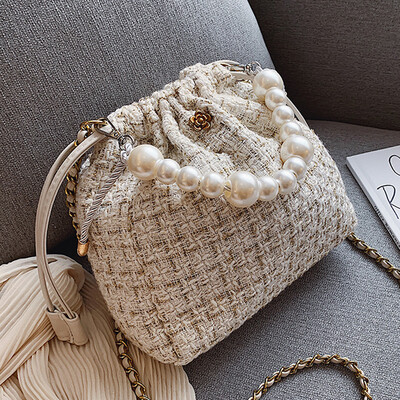 On the new small bag 2019 new Korean wool chain Pearl portable bucket bag slung shoulder bag
On the new small bag 2019 new Korean wool chain Pearl portable bucket bag slung shoulder bag