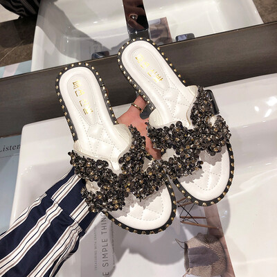 Wind slippers of INS port wear Korean version of H-slipper rivet flat sole shoes in summer
Wind slippers of INS port wear Korean version of H-slipper rivet flat sole shoes in summer