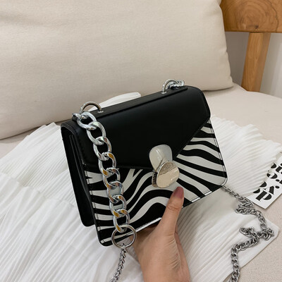 Small bag female new wild chain contrast color shoulder Messenger bag fashion lock small square bag
Small bag female new wild chain contrast color shoulder Messenger bag fashion lock small square bag