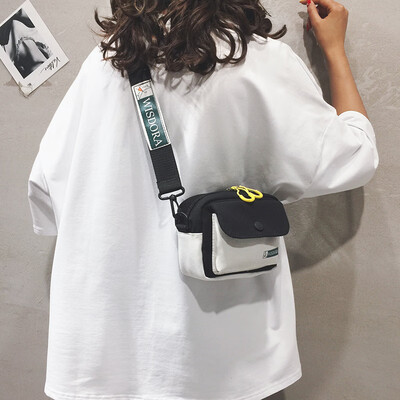 Student bag female 2019 new Japanese Harajuku canvas bag Korean casual wild mini shoulder Messenger bag 
Student bag female 2019 new Japanese Harajuku canvas bag Korean casual wild mini shoulder Messenger bag