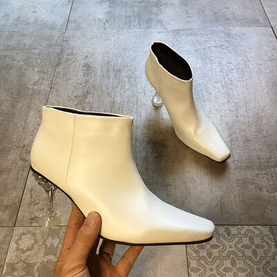 Martin boots European&American crystal transparent high heels trendy boots handsome locomotive boots
Martin boots European&American crystal transparent high heels trendy boots handsome locomotive boots