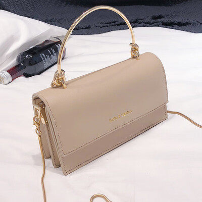 Spring new small fragrance bag female 2019 new wave Korean version of the wild Messenger shoulder portable magnetic buckle small square bag 
Spring new small fragrance bag female 2019 new wave Korean version of the wild Messenger shoulder portable magnetic buckle small square bag