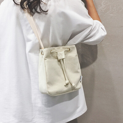 Net red bucket small bag female 2019 new wave Korean version of the ocean shoulder bag texture fashion canvas slung small square bag
Net red bucket small bag female 2019 new wave Korean version of the ocean shoulder bag texture fashion canvas slung small square bag