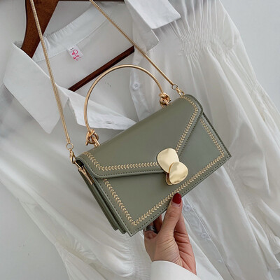 Qiao Bani 2019 new Korean chic fashion embroidery thread chain flip hard handle handbag shoulder diagonal handbag
Qiao Bani 2019 new Korean chic fashion embroidery thread chain flip hard handle handbag shoulder diagonal handbag