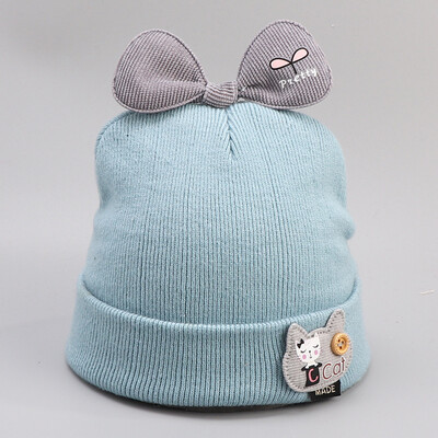 Dongyun new autumn&winter childrens knitting pure cotton bow cartoon button cap 
Dongyun new autumn&winter childrens knitting pure cotton bow cartoon button cap