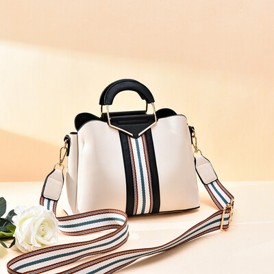 Handbag woman large capacity slant bag simple air impingement soft temperament single shoulder Korean version 100 
Handbag woman large capacity slant bag simple air impingement soft temperament single shoulder Korean version 100
