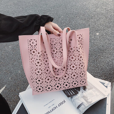 Foreign womens bag Korean fashion hollow Tote bag wild temperament handbag shoulder Messenger bag
Foreign womens bag Korean fashion hollow Tote bag wild temperament handbag shoulder Messenger bag