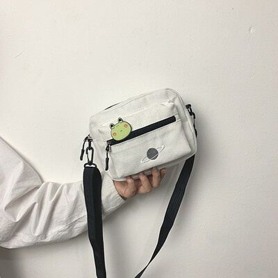 2019 new cartoon planet canvas small square bag temperament fashion chic Messenger bag female simple wild shoulder bag
2019 new cartoon planet canvas small square bag temperament fashion chic Messenger bag female simple wild shoulder bag