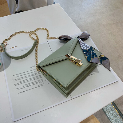 Qiao Bani 2019 new European&American style fashion simple solid color silk scarf chain clamshell bag shoulder diagonal tide handbag
Qiao Bani 2019 new European&American style fashion simple solid color silk scarf chain clamshell bag shoulder diagonal tide handbag