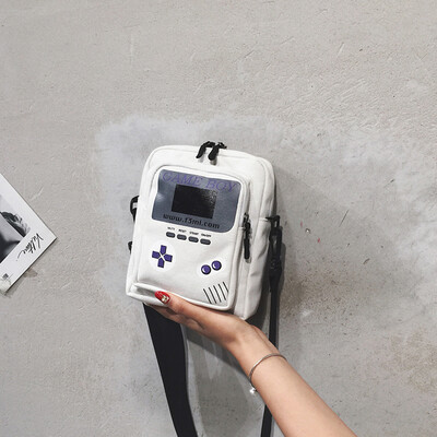 Personality creative small bag female 2019 new Hong Kong style retro game machine single shoulder slung Korean version of the wide canvas bag
Personality creative small bag female 2019 new Hong Kong style retro game machine single shoulder slung Korean version of the wide canvas bag