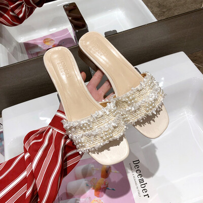 Slippers women wear summer Korean version of Joker Beaded word drag fashion low heel fairy sandals
Slippers women wear summer Korean version of Joker Beaded word drag fashion low heel fairy sandals