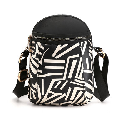 Waterproof oblique bag female Korean version vertical printing mobile phone bag 100 light pocket mini bag
Waterproof oblique bag female Korean version vertical printing mobile phone bag 100 light pocket mini bag