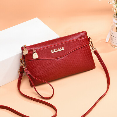 Mother bag middle-aged woman bag small oblique satchel bag foreign air small one-shoulder bag fashion simple lady holding bag
Mother bag middle-aged woman bag small oblique satchel bag foreign air small one-shoulder bag fashion simple lady holding bag