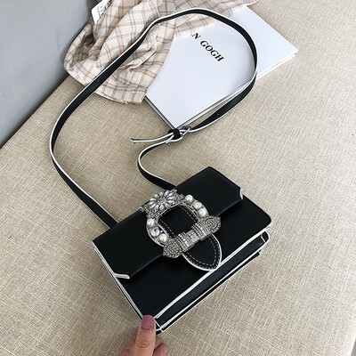 Qiao Bani 2019 new Korean fashion Dongdaemun solid color pearl small square bag wild shoulder diagonal PU handbag
Qiao Bani 2019 new Korean fashion Dongdaemun solid color pearl small square bag wild shoulder diagonal PU handbag