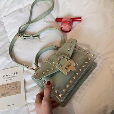 New bag female 2019 new Korean version of the wild shoulder slung fashion rivet portable transparent jelly small square bag
New bag female 2019 new Korean version of the wild shoulder slung fashion rivet portable transparent jelly small square bag