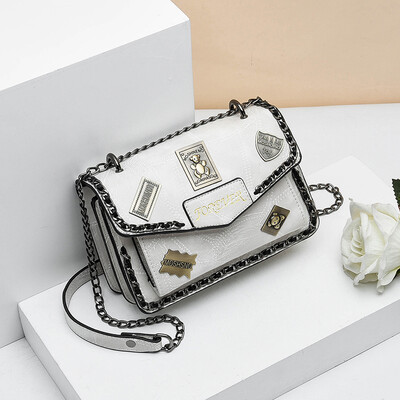 Retro spring&summer tide woman hand-held retro badge 100 lap rivets chain single shoulder oblique satchel bag
Retro spring&summer tide woman hand-held retro badge 100 lap rivets chain single shoulder oblique satchel bag