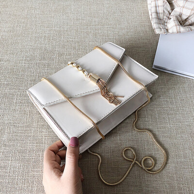 Qiao Bani 2019 new South Korea Dongdaemun fashion simple solid color chain small square bag shoulder diagonal female bag
Qiao Bani 2019 new South Korea Dongdaemun fashion simple solid color chain small square bag shoulder diagonal female bag