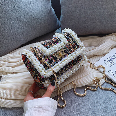 Korean version of Joker small bag chic chain Pearl small square bag new 2019 lock womens shoulder bag Messenger bag
Korean version of Joker small bag chic chain Pearl small square bag new 2019 lock womens shoulder bag Messenger bag