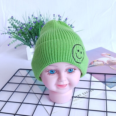 Childrens wool hats Korea autumn&winter new warm smiling face knit cap head cap boys&girls baby hat candy
Childrens wool hats Korea autumn&winter new warm smiling face knit cap head cap boys&girls baby hat candy