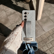 卓際（ZHUOJI）適用三星zflip6手機殼2025皮革牛仔Z Flip6保護殼套w25flip外殼Samsung女5腕帶掛繩Galaxy折疊屏高 銀殼皮革牛仔腕帶金屬標 三星Galaxy Z Fold3