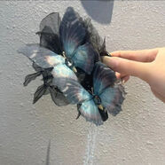 唐芙妮展現你的獨特魅力時(shí)尚黑色蝴蝶百搭鯊魚(yú)夾精致優(yōu)雅后腦勺盤(pán)發(fā)器 靈動(dòng)藍色--蝴蝶流蘇鯊魚(yú)夾