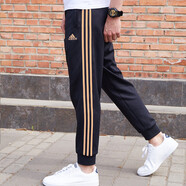 阿迪達斯 （adidas）運動(dòng)褲男秋季防風(fēng)休閑衛褲健身跑步運動(dòng)褲 黑金收腿褲 S