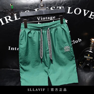 薩拉維夫（SLLAVIF）品牌運(yùn)動(dòng)休閑短褲男夏款2025新款中青年高級(jí)感五分褲子痞帥直筒 綠色 M