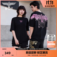 BOY LONDON【白羽入夜】春夏情侶款潮牌朋克時尚紫外線光變短袖T恤N01914 黑印粉 （玫紅色光變印花） L