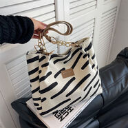 葉余帆布包包女包今年流行小眾大容量大單肩包條紋包 白色