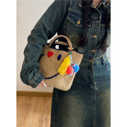 沙灘度假草編包韓國甜美糖果色小眾愛(ài)心笑臉麻繩掛墜手提包 太好看了，眼睛愛(ài)心包包