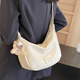 慕昂休閑百搭餃子包時(shí)尚包包女2024新款春夏通勤小眾質(zhì)感單肩斜挎小包 米白色帶掛件