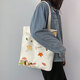 萌淘熊 帆布包女單肩ins韓風(fēng)日系北歐國王動(dòng)漫禮品大學(xué)生手提補習布袋 一葉知秋-米色