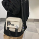 威納登斜挎包男潮牌撞色小包包學(xué)生單肩包女郵差工裝包休閑百搭手機包 米白色（送徽章）