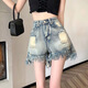 瑟空（SEKONG）2026夏新款復古做舊個(gè)性牛仔褲辣妹破洞褲子女毛邊a字寬松短褲YLM 1129藍色 S