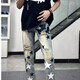 益帛（YIBO）破洞牛仔褲男春季新款歐美風(fēng)高街星星貼布vibe修身小腳長(zhǎng)褲子男 黃泥色 L【建議110-125斤】