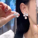 伊燦不對稱鋯石花朵仿珍珠耳釘女高級耳環(huán)無洞耳夾2025年新款爆款耳飾 不對稱鋯石花朵耳釘