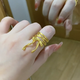 瑞諾黃金綁帶蝴蝶結(jié)戒指女新款足金999在逃公主素圈戒子指環(huán)生日禮物 黃金綁帶蝴蝶結(jié)開口戒指/金重約9.58g