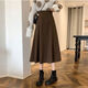 云皎毛呢半身裙女秋冬中長(cháng)款高腰A字裙小個(gè)子傘裙顯瘦寬松大擺裙 咖色 S建議98斤以?xún)? title=