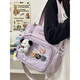 瑞潮日系百高顏值單肩斜挎包ins學(xué)院風(fēng)補習袋少女包包大容量吧唧痛包 紫色【領(lǐng)結小狗+4個(gè)徽章】