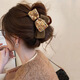 松窗夢(mèng)語(yǔ)AB面毛呢蝴蝶結抓夾秋冬2025新款發(fā)夾女后腦勺鯊魚(yú)夾大號夾子發(fā)飾 焦糖南瓜抓夾-8cm