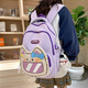 米諾婭書(shū)包女初中生卡通高中背包可愛(ài)少女韓版小學(xué)生大容量百搭雙肩包 紫色+小狗掛件