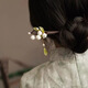 捷懿2023新款玉蘭花木質(zhì)發(fā)簪簡(jiǎn)約盤發(fā)頭飾鈴蘭花復(fù)古旗袍配飾流蘇漢服 綠色玉蘭花發(fā)簪長(zhǎng)約18