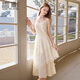 香影吊帶連衣裙女2026春季新款法式海邊v領(lǐng)裙子蕾絲邊內搭蛋糕裙 米色 M