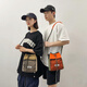 犀利小姐ins潮牌斜挎包男女手機(jī)包機(jī)能工裝學(xué)生潮流小挎包抽繩戶(hù)外水桶包 桔拼綠色