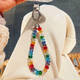 YWZR彩虹水晶珠彩色手機鏈女多巴胺爆閃手工串珠包包掛件ccd相機掛鏈 七彩水晶鏈(送墊片)