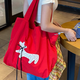 妙奕嘉紅色托特包大容量通勤帆布包包女款2025年新款單肩包挎包旅行夏季 紅色絲帶狗抽繩單肩包-不帶掛件